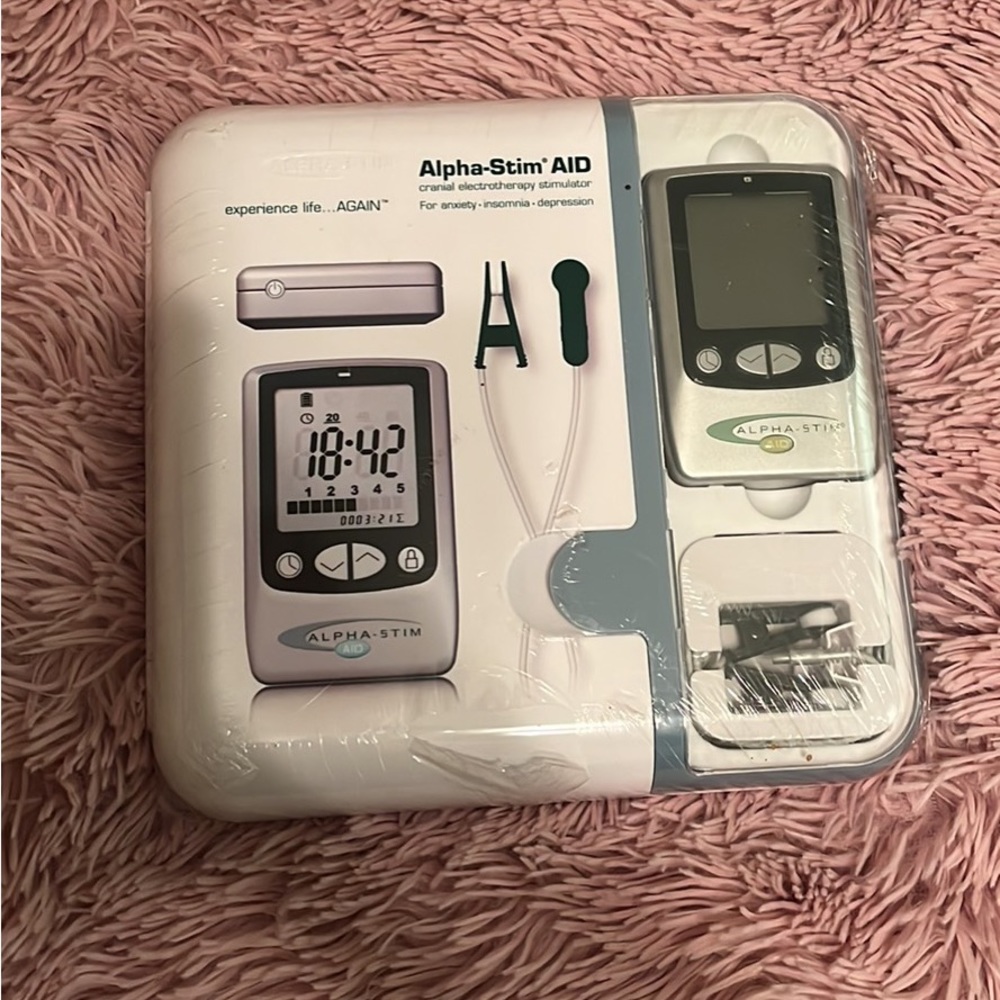 Alpha-Stim AID cranial electrotherapy stimulator